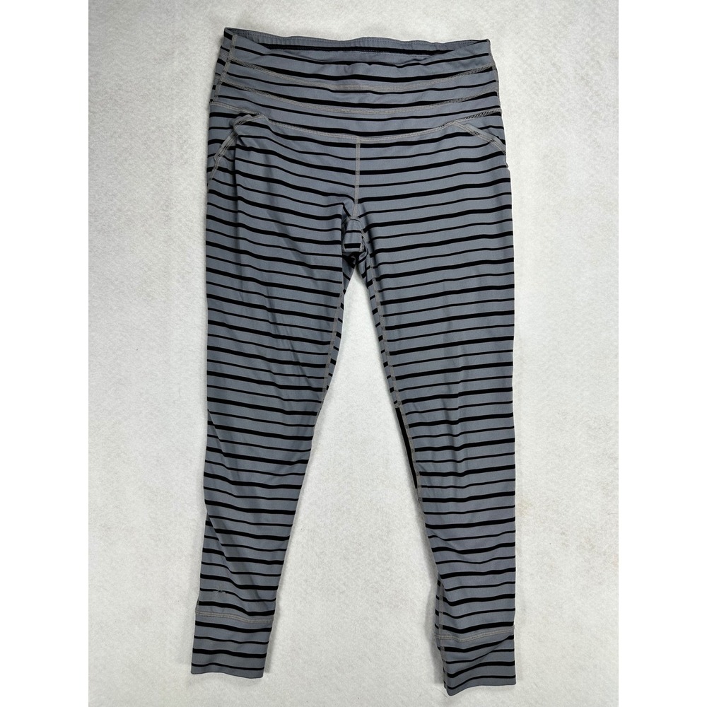 Athleta Womens M Striped Gray Black Mesh Panel Ruched Leggings Zip Tech Pocket